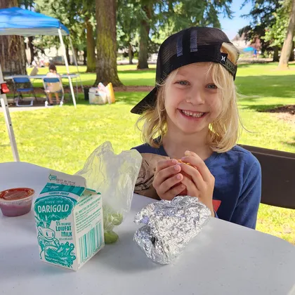 Child enjoying Share Vancouver Summer Meal Program